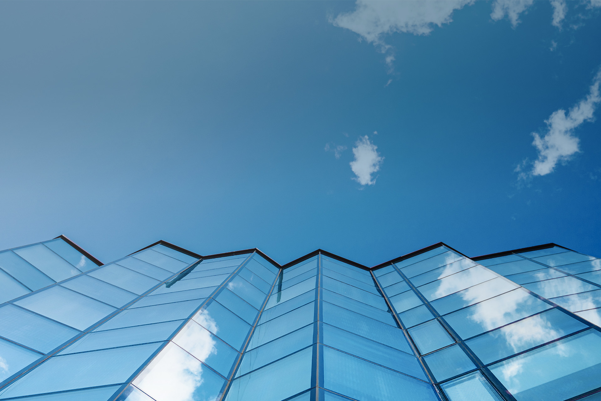 blue building view from under with blue sky